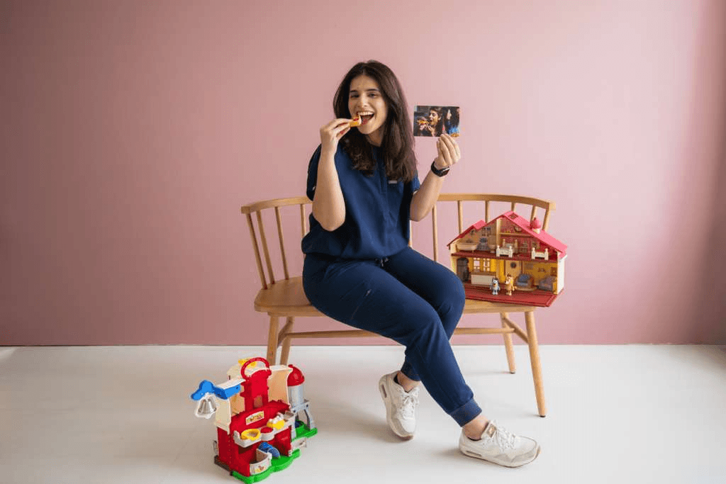 Verda with play-based therapy toys, supporting pediatric speech and language care