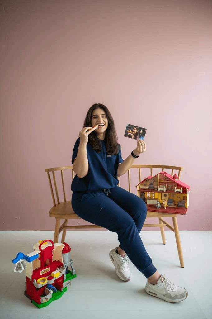 Verda with play-based therapy toys, reflecting a joyful, child-centered approach